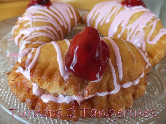 Easy Cherry Turnovers with Pink Vanilla Glaze